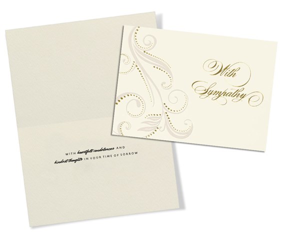 elegant sympathy card with decorative swirls and gold text