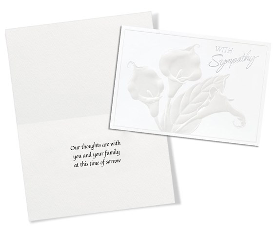 white sympathy card with embossed flowers and text, includes envelope