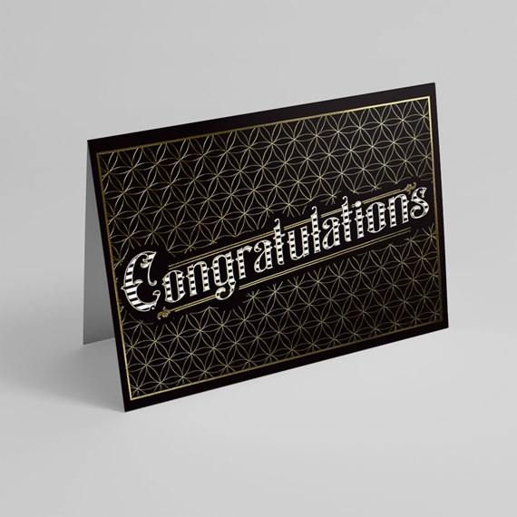 black card with geometric pattern and congratulations text
