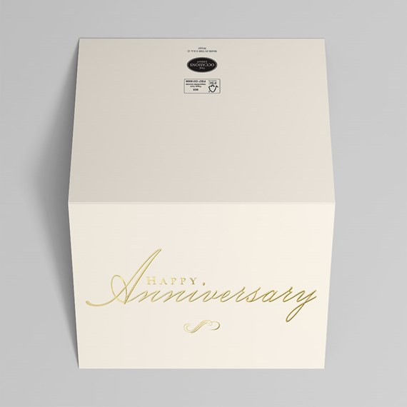 cream box with gold text 'Happy Anniversary'