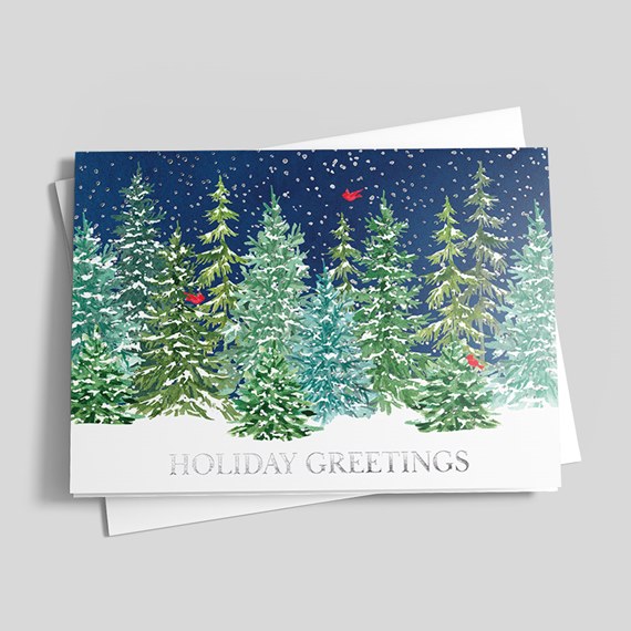 winter greeting card with evergreen trees and holiday text