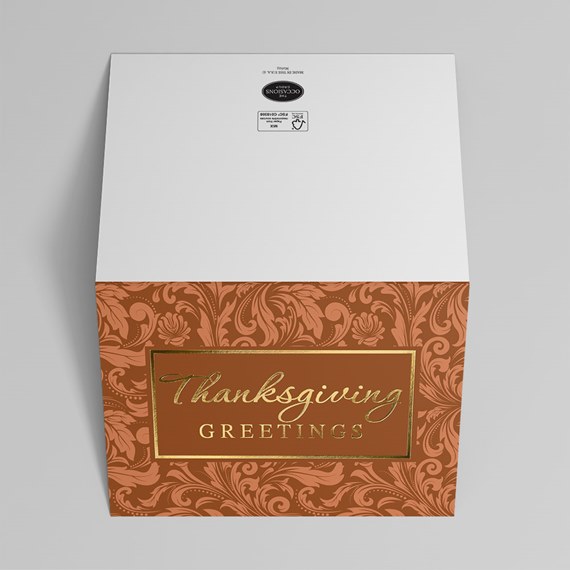decorative box with floral design and greeting text