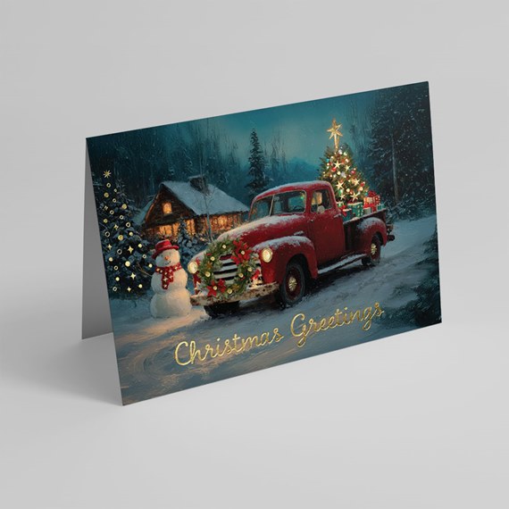 holiday greeting card with vintage truck, snowman, and trees