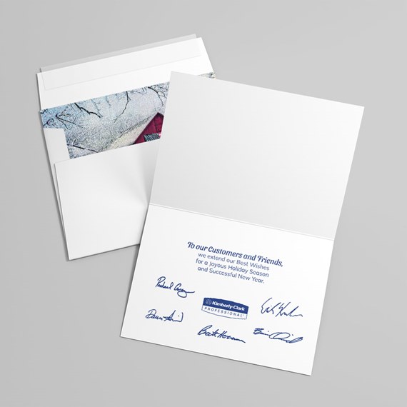 greeting card with snowy scene and blue printed message