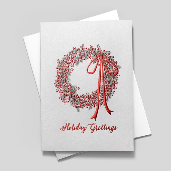 holiday wreath card with red berries and bow