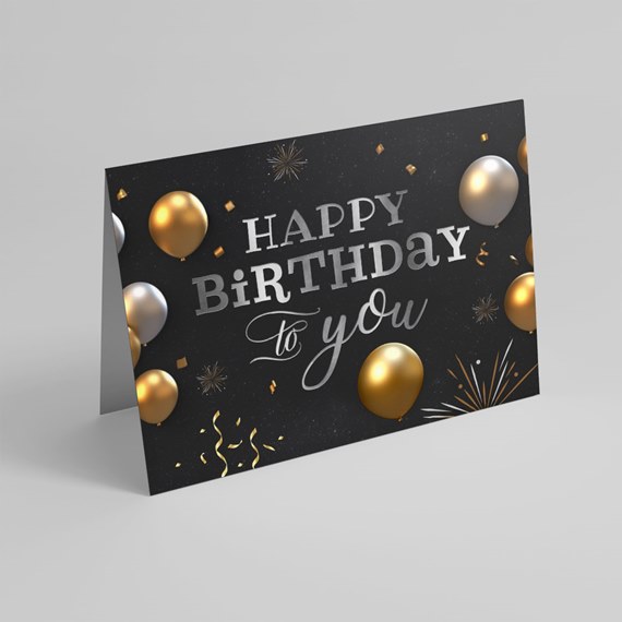 birthday card design with balloons and festive text