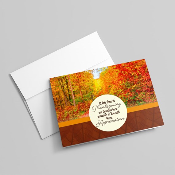 greeting card with autumn scene and text area
