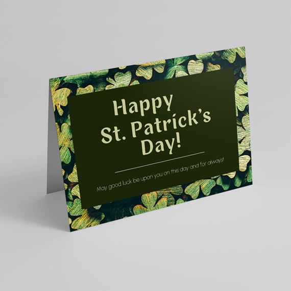 greeting card with clovers and text