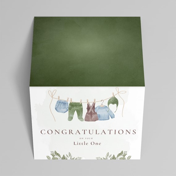 decorative box with clothesline illustration and text