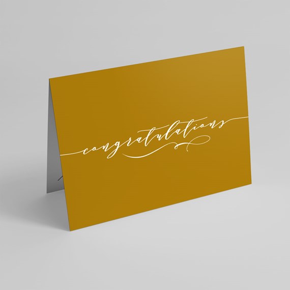 mustard yellow card with white script text