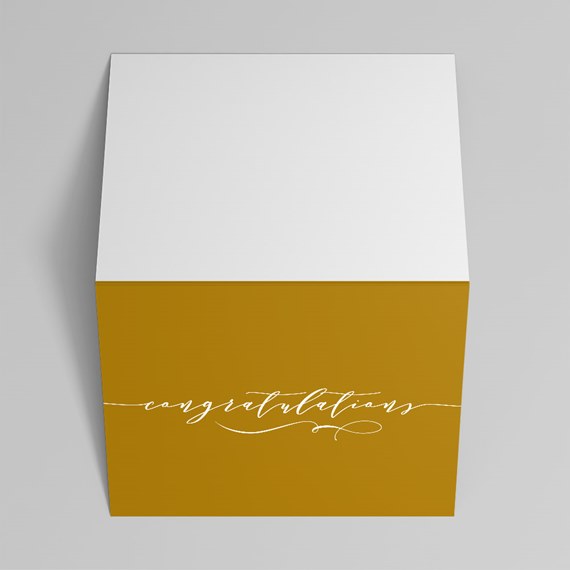 golden box with white script text