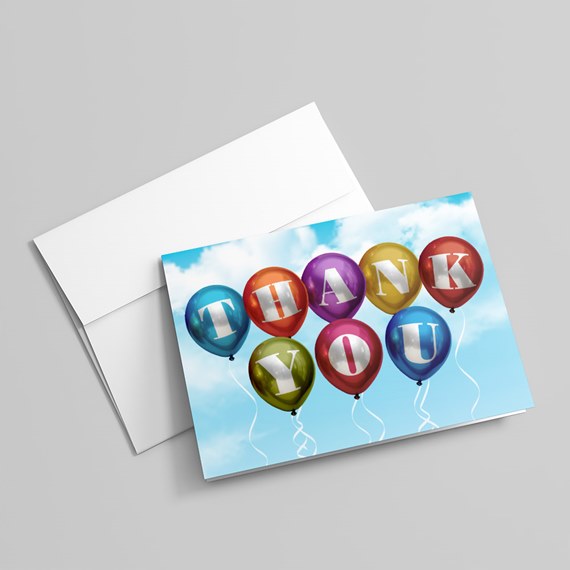 colorful balloons with thank you text on card