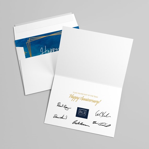 anniversary card with blue interior and gold accents