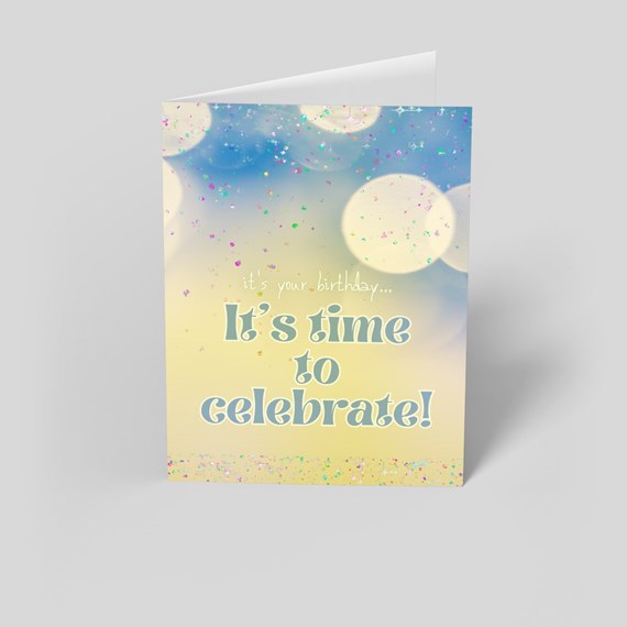 birthday card with confetti and bokeh lights