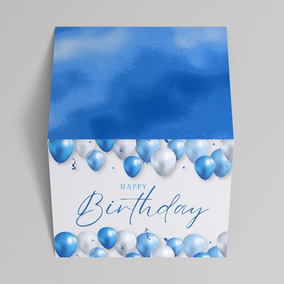 birthday box with blue and silver balloons and text