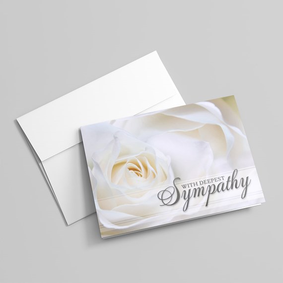greeting card with white roses and sympathy text