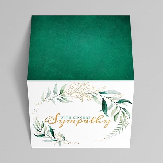 green and white sympathy box with floral design
