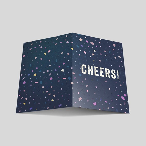 greeting card with confetti and cheers text