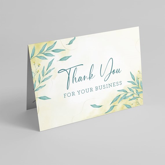thank you card with watercolor leaves and text
