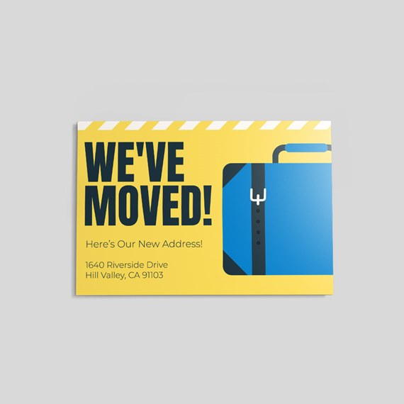 bright yellow greeting card with suitcase illustration and text area