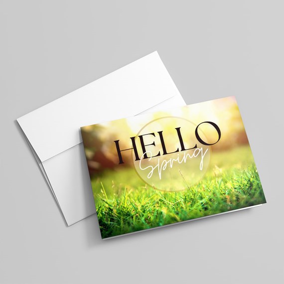greeting card with text and grass background, photo placeholder