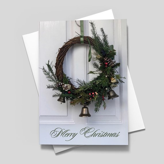 Christmas wreath with bells and festive decorations
