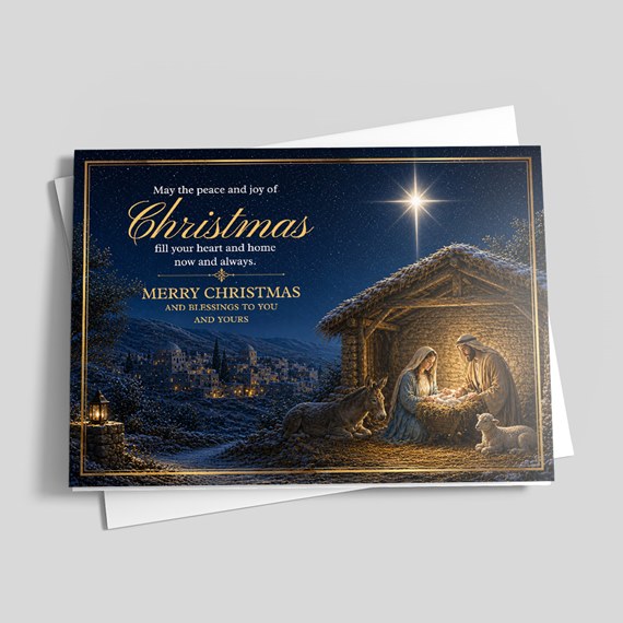 Christmas card with nativity scene and gold text