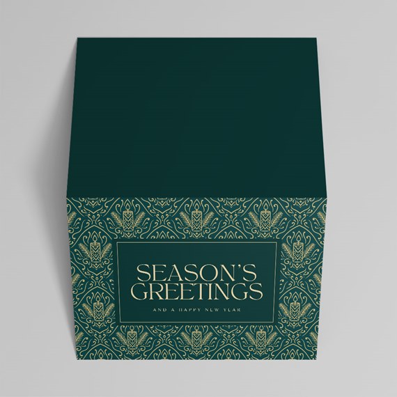 green card with gold pattern and text