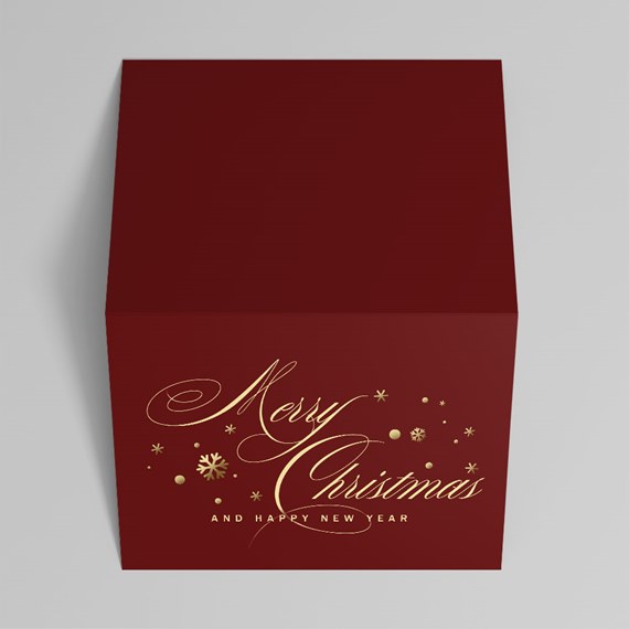 red box with gold Christmas text and decorative elements