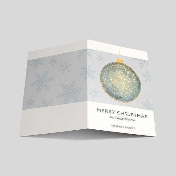 Christmas card with ornament and snowflakes