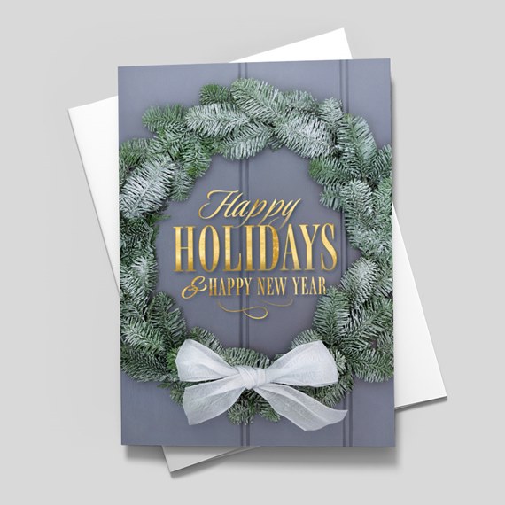 holiday card with wreath and text