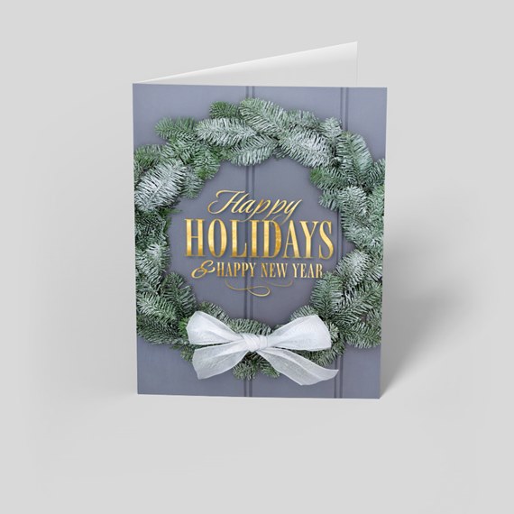 greeting card with pine wreath and bow