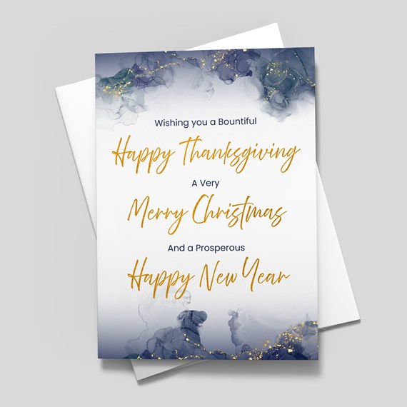 greeting card with watercolor design and gold accents