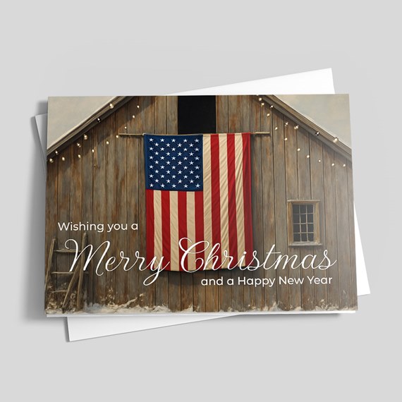 barn with american flag and holiday greeting text