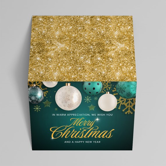 decorative box with Christmas ornaments and text