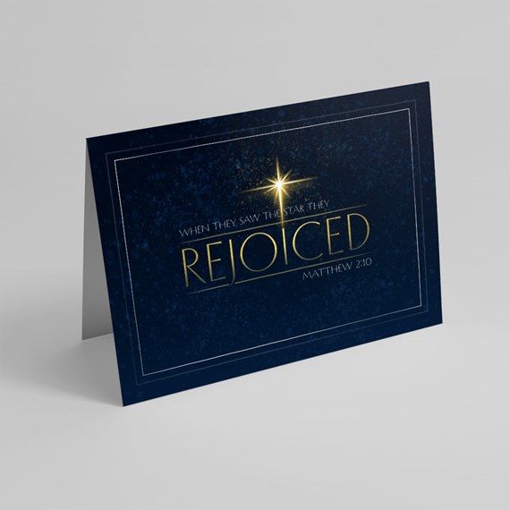 navy blue card with gold text and star design