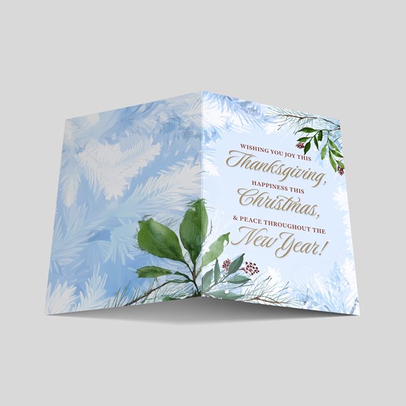 card design with festive text and leaf illustrations
