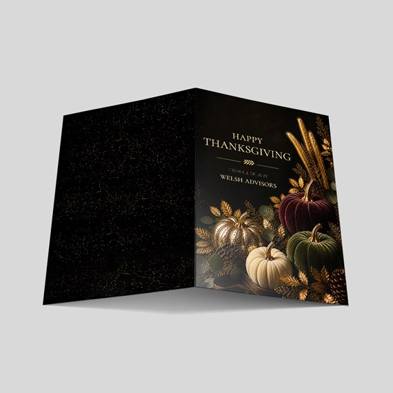 Thanksgiving card with pumpkins and foliage design