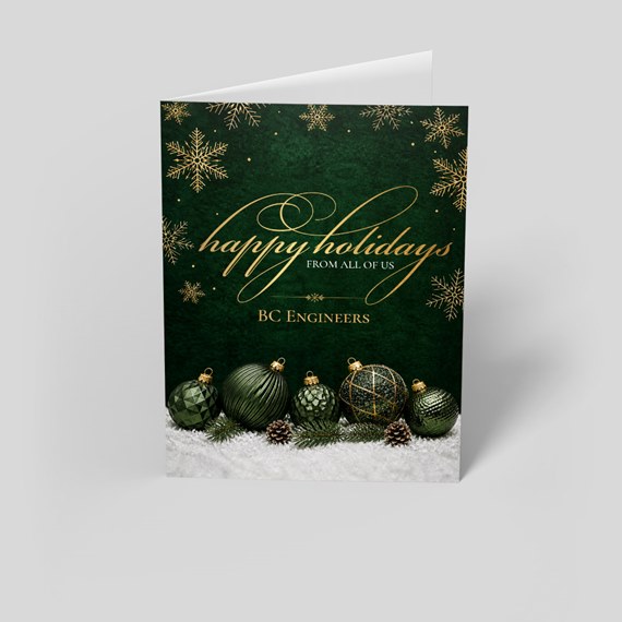 holiday greeting card with green ornaments and snowflakes