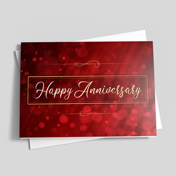 red anniversary card with gold text