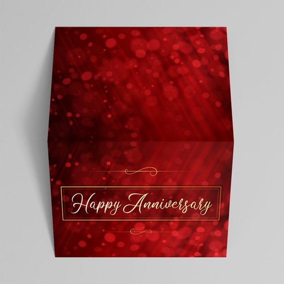 anniversary card with bokeh background and gold text