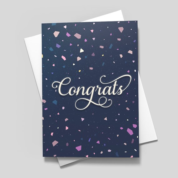 greeting card with confetti design and congratulations text