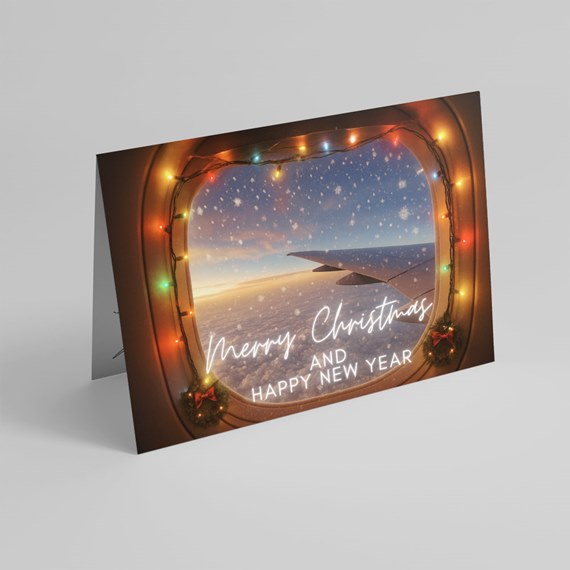 airplane window design with holiday text and colorful lights