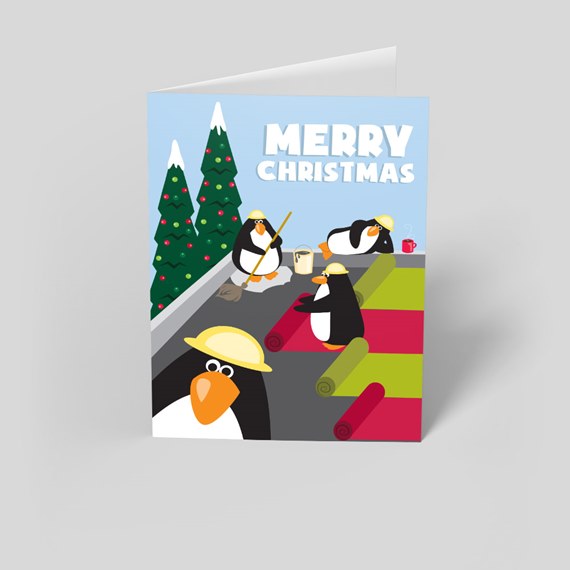 cartoon penguins on a rooftop with Christmas trees and 'MERRY CHRISTMAS' text