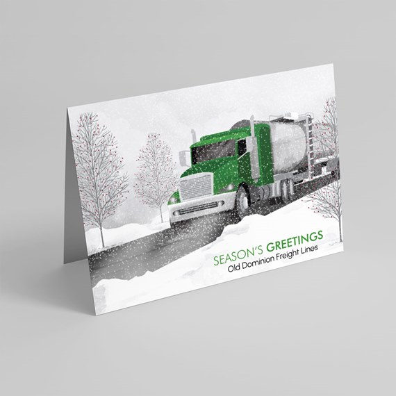 greeting card with green truck in snow scene