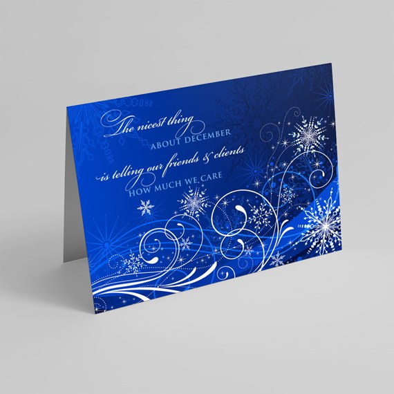 blue greeting card with snowflakes and decorative text