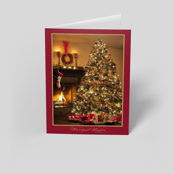Christmas greeting card with tree and fireplace