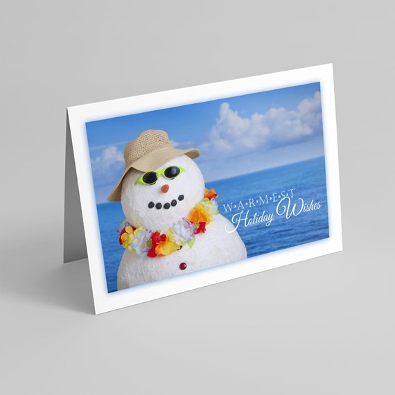 snowman with accessories, ocean background, holiday card design