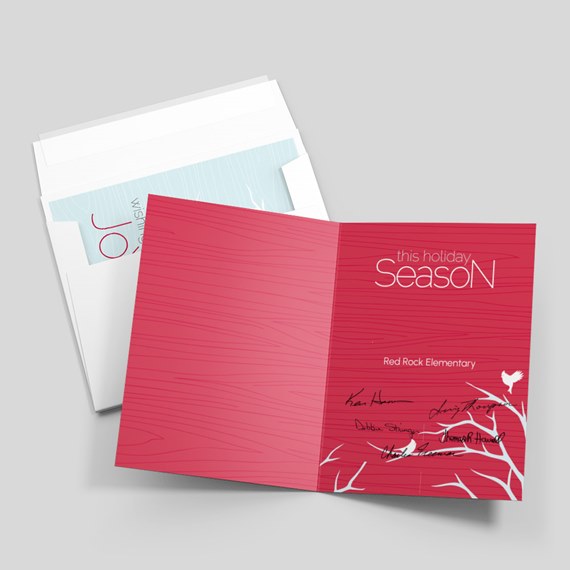 holiday card with red background and white branches
