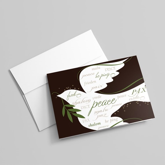 dove design card with peace words and envelope